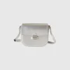 Small crossbody bag in synthetic patent leather