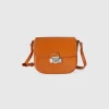 Small crossbody bag in synthetic patent leather