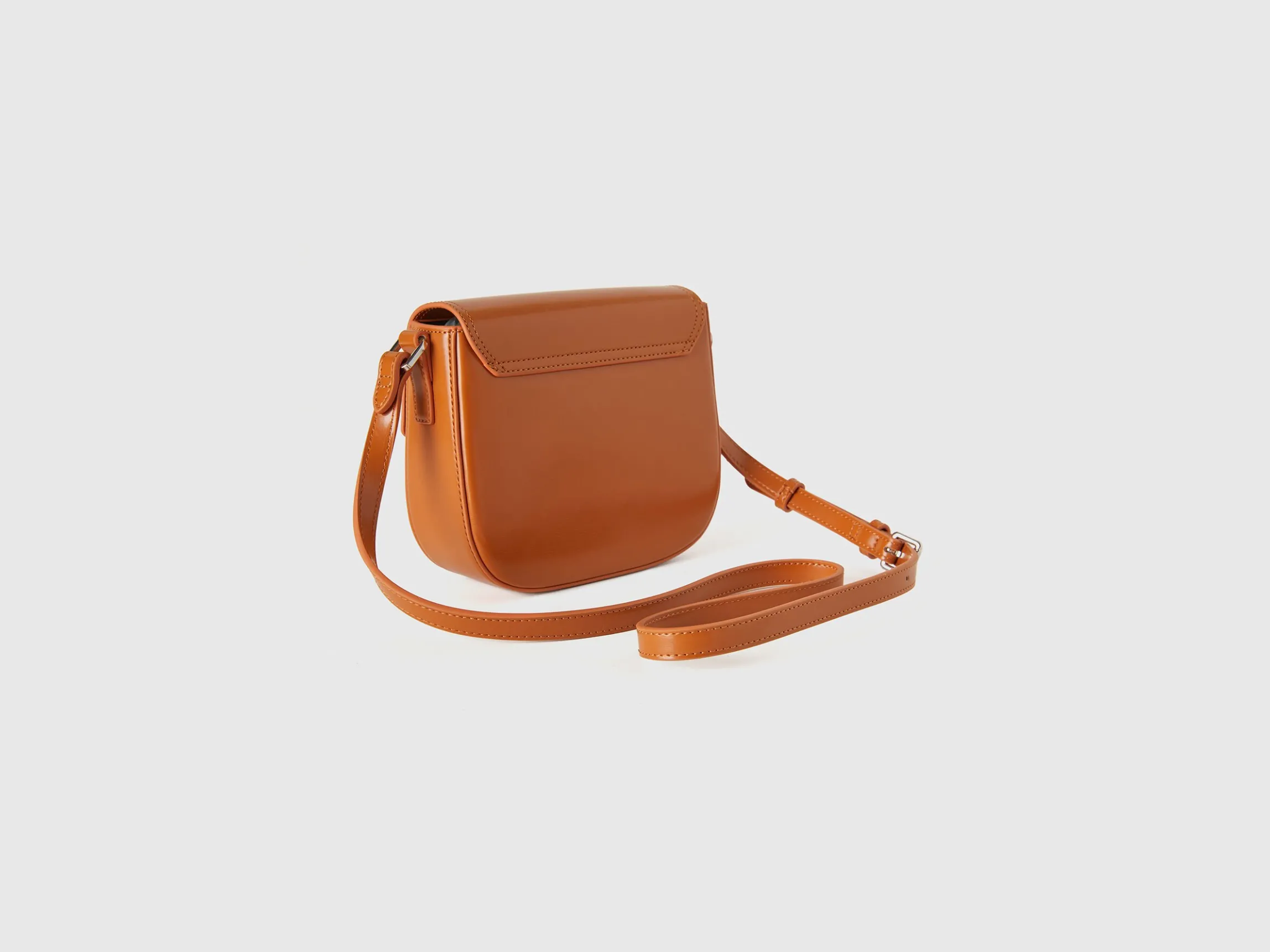 Small crossbody bag in synthetic patent leather