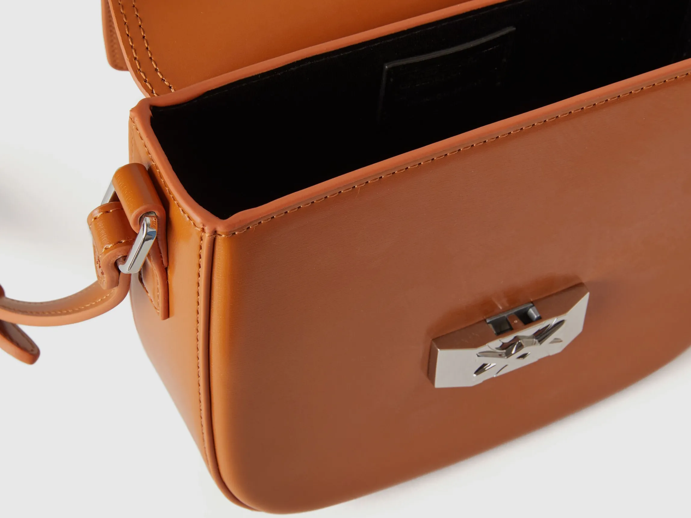 Small crossbody bag in synthetic patent leather