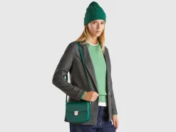 Small crossbody bag in synthetic patent leather