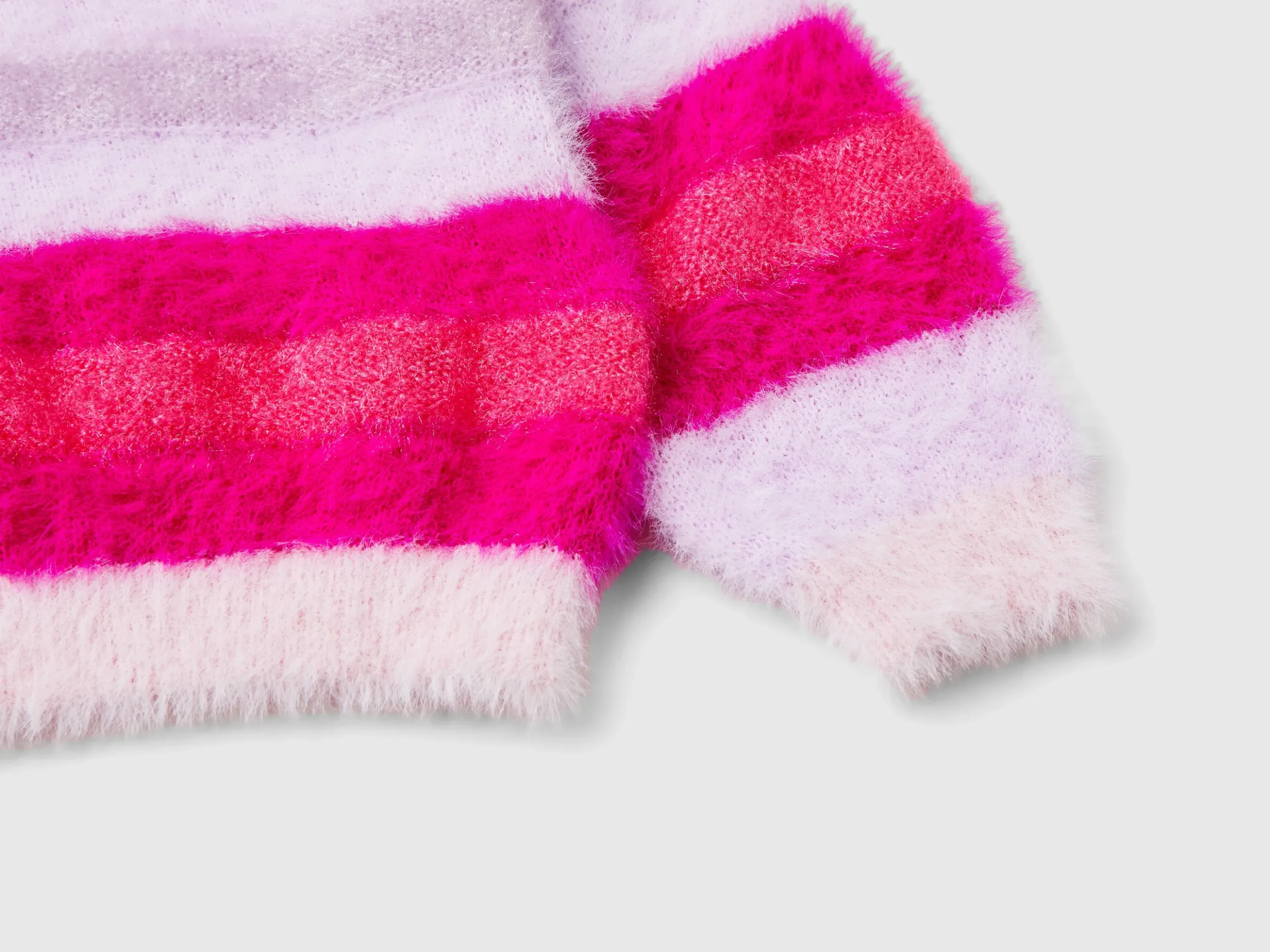 Striped sweater in faux fur