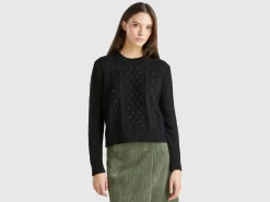 Sweater with cable knit and rhinestones