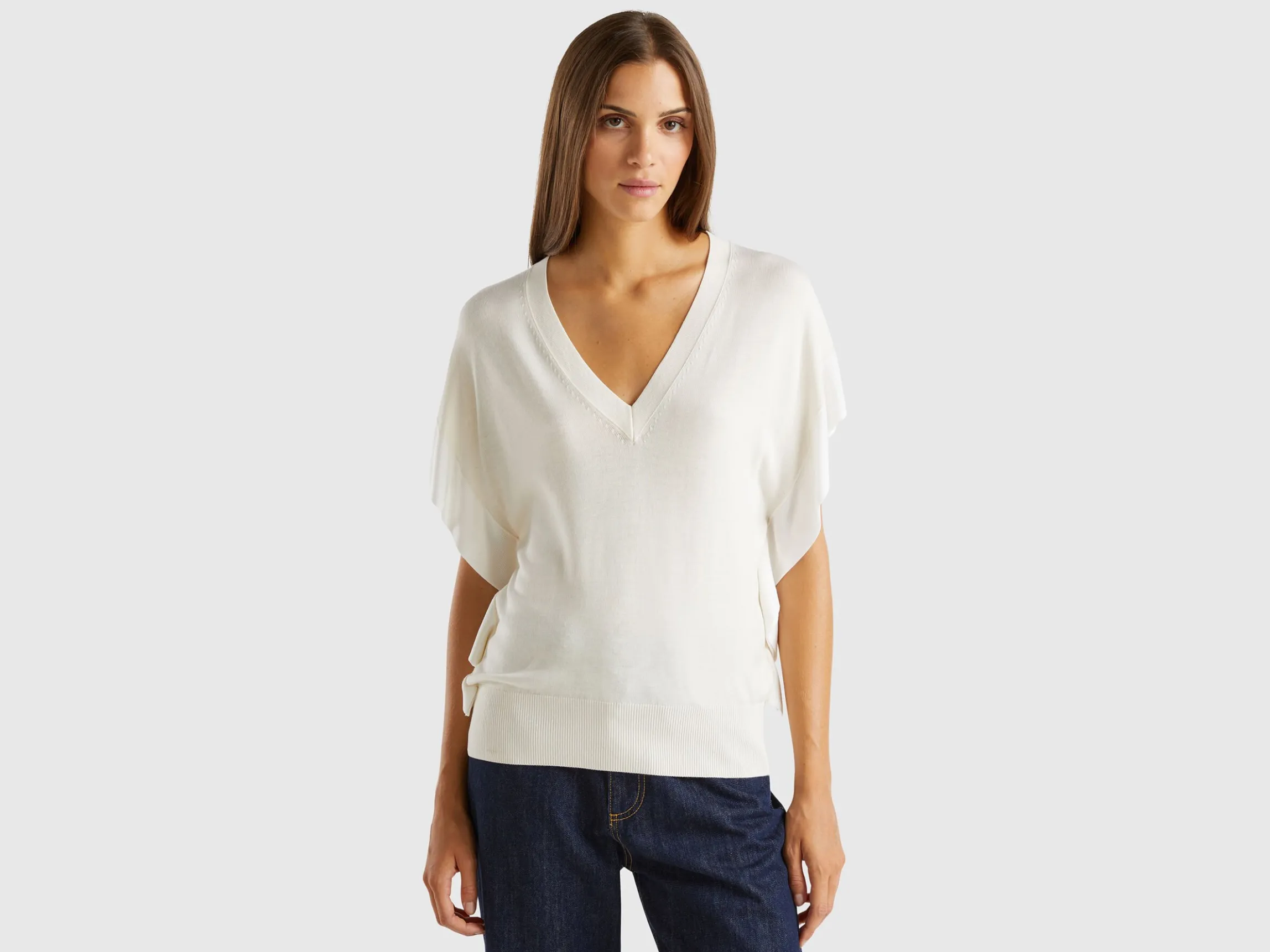 Sweater with draping