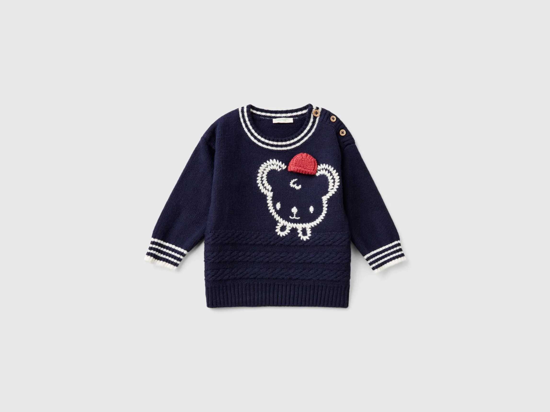 Sweater with embroidery and applique