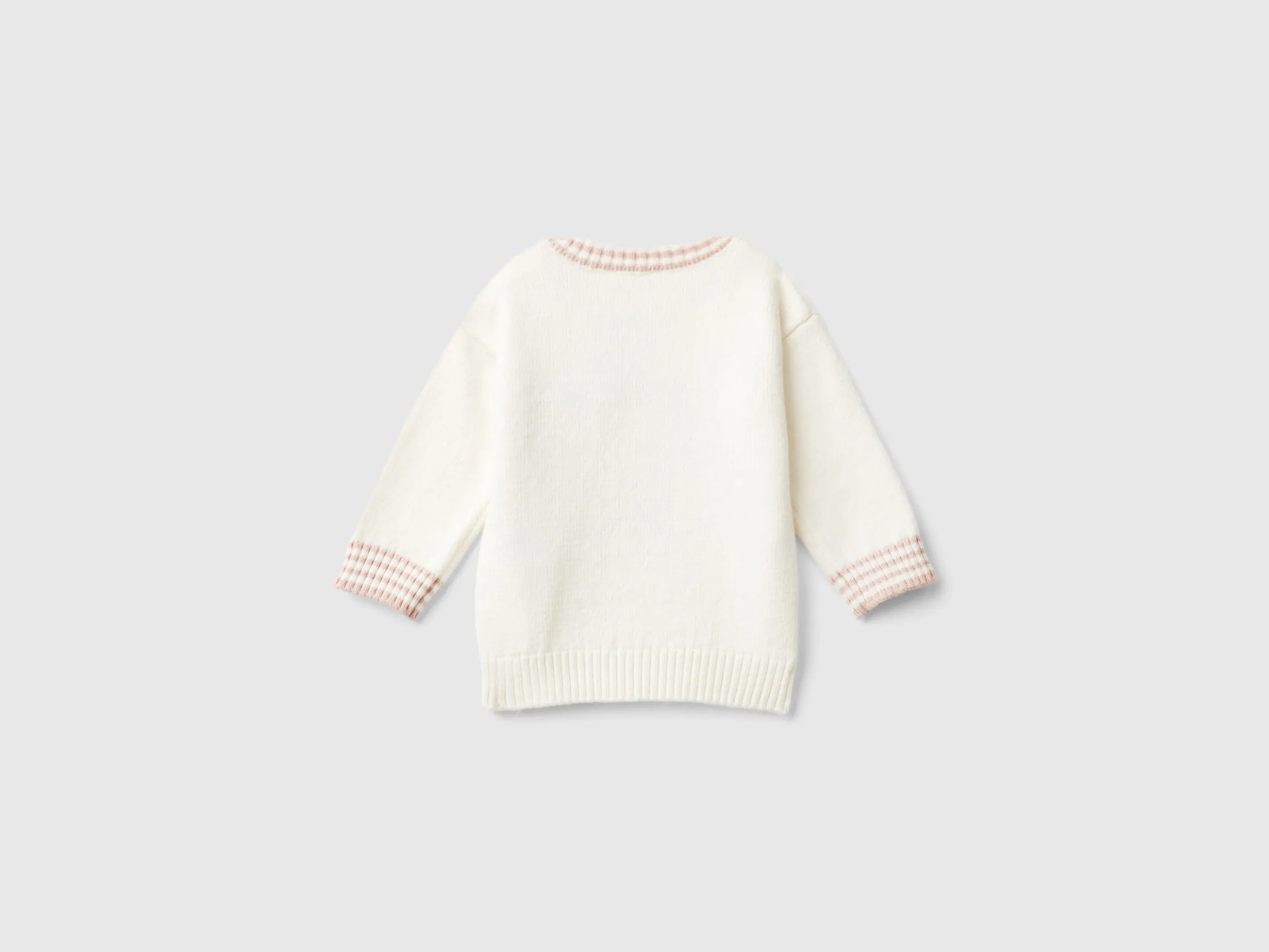 Sweater with embroidery and applique