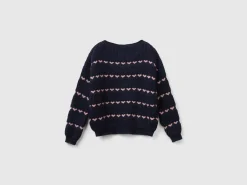 Sweater with heart inlay