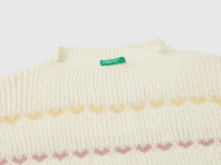 Sweater with heart inlay