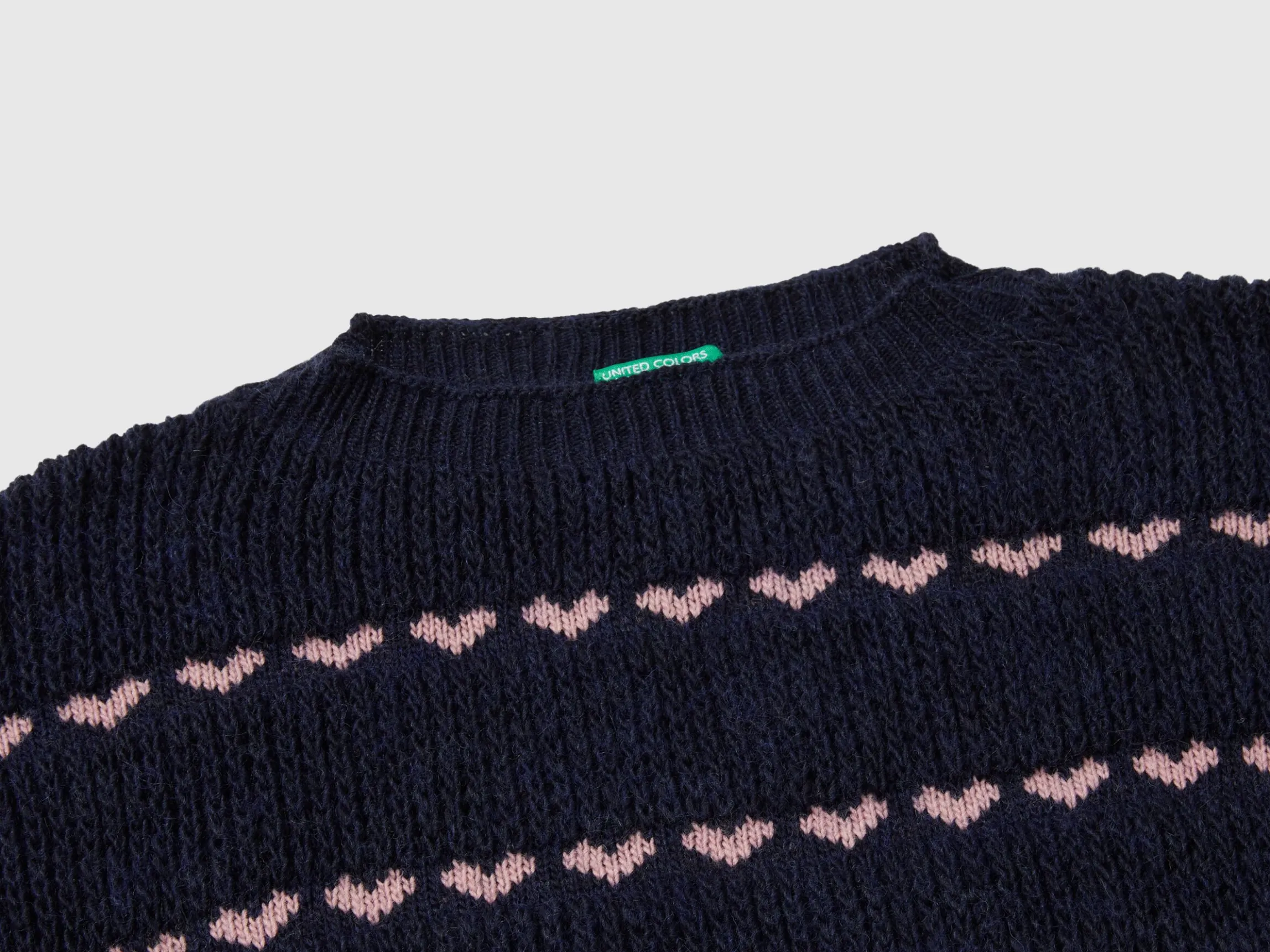 Sweater with heart inlay