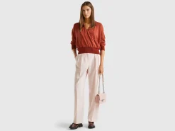 Sweater with opening at back