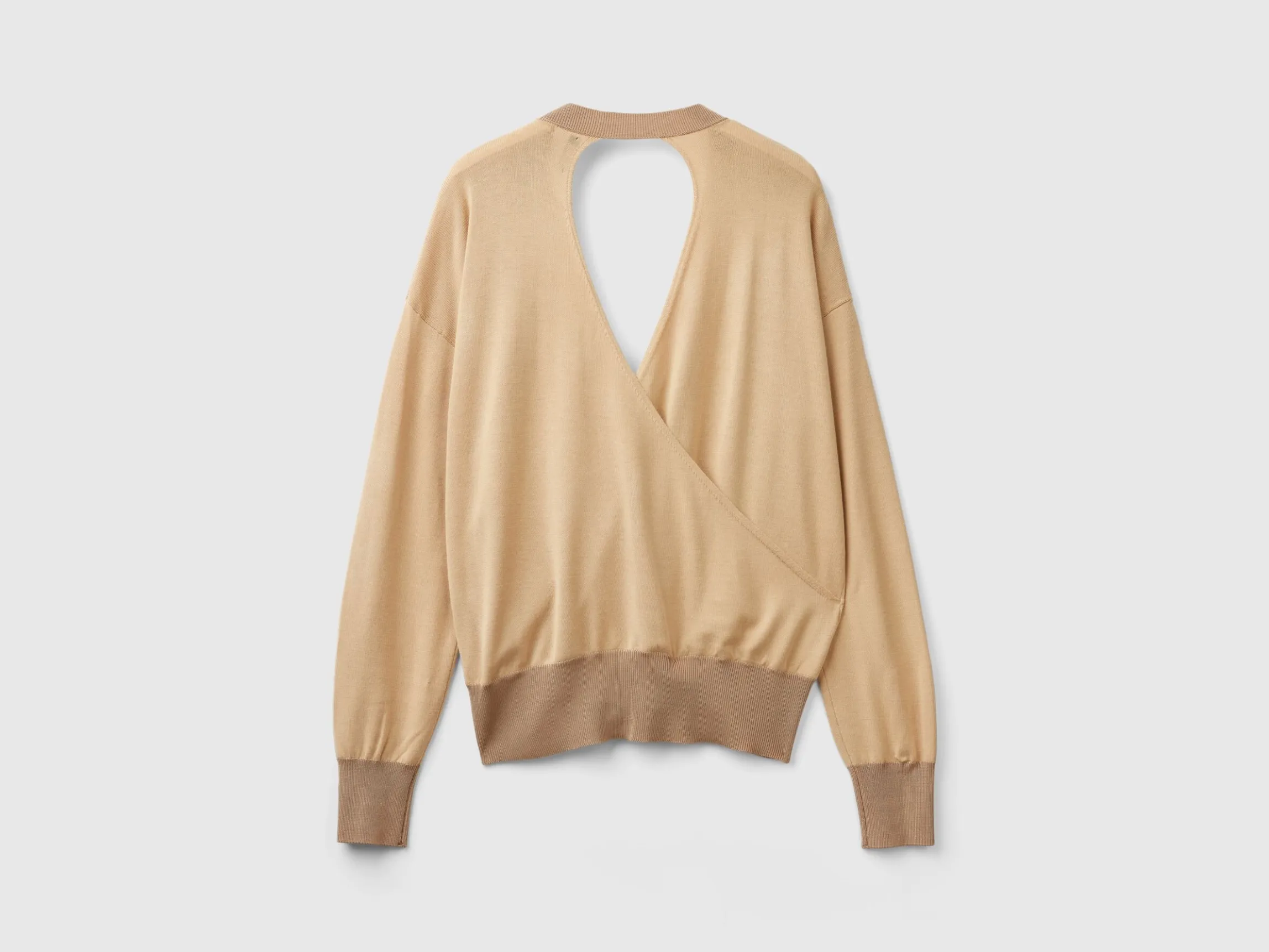 Sweater with opening at back