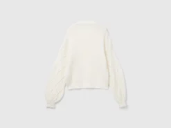 Sweater with perforated sleeve