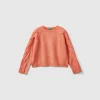 Sweater with recycled fabric and sequins