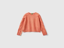 Sweater with recycled fabric and sequins