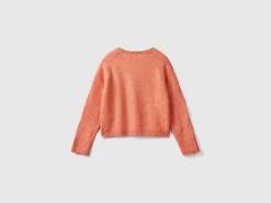 Sweater with recycled fabric and sequins
