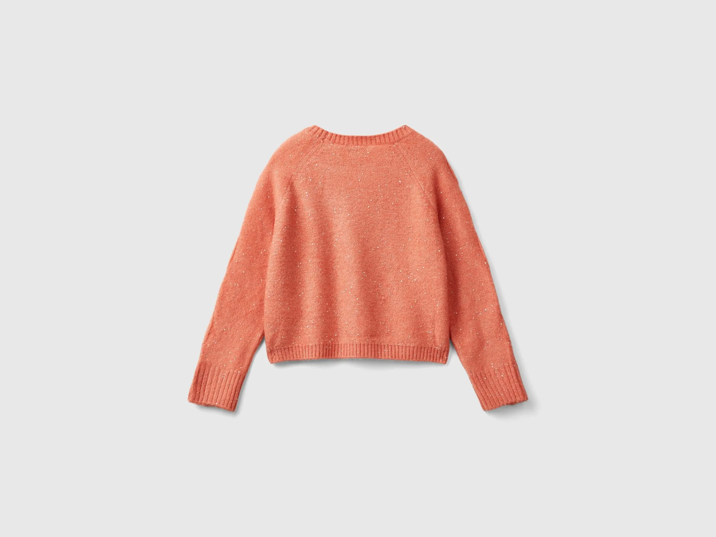 Sweater with recycled fabric and sequins