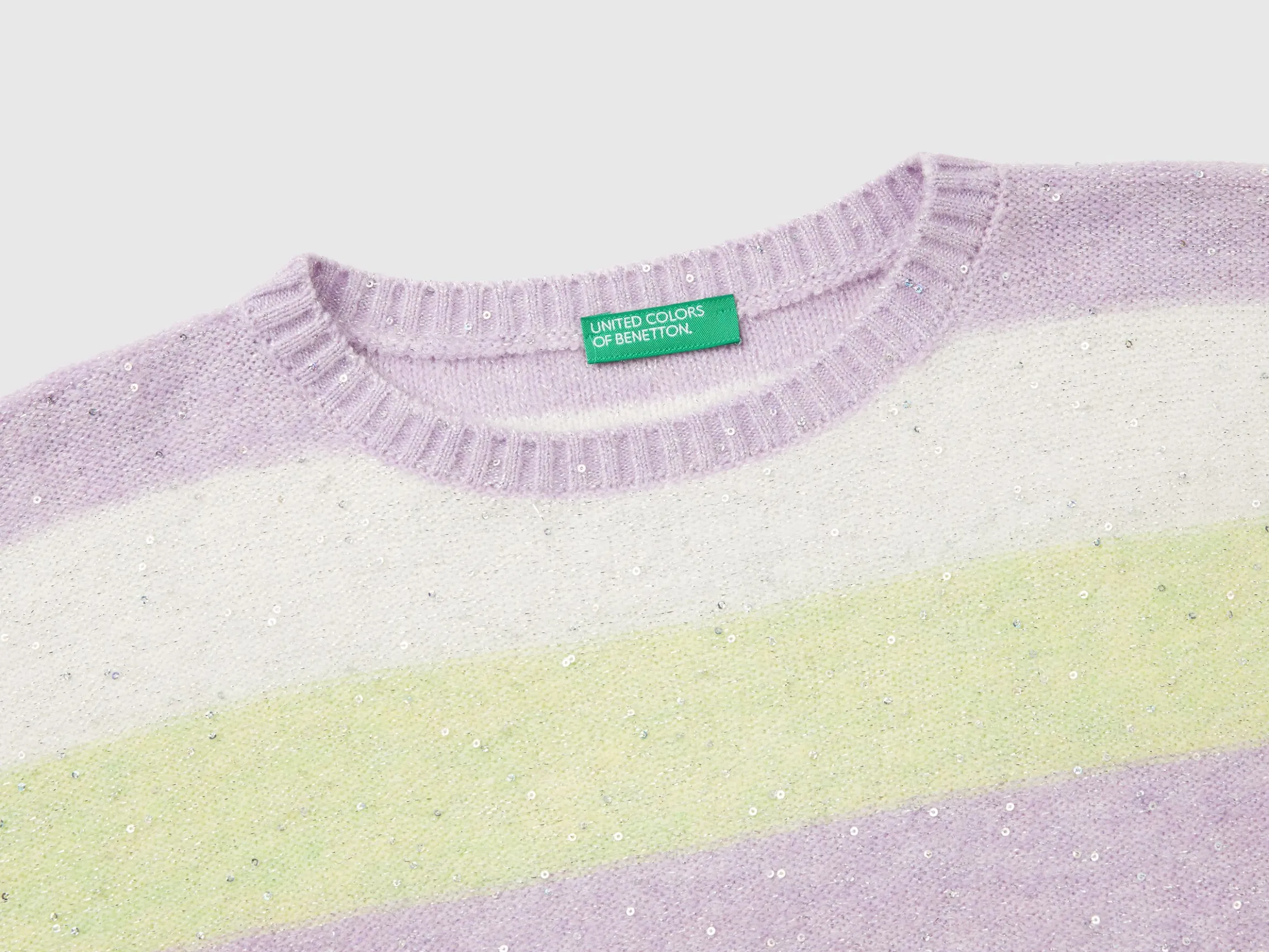 Sweater with recycled fabric and sequins