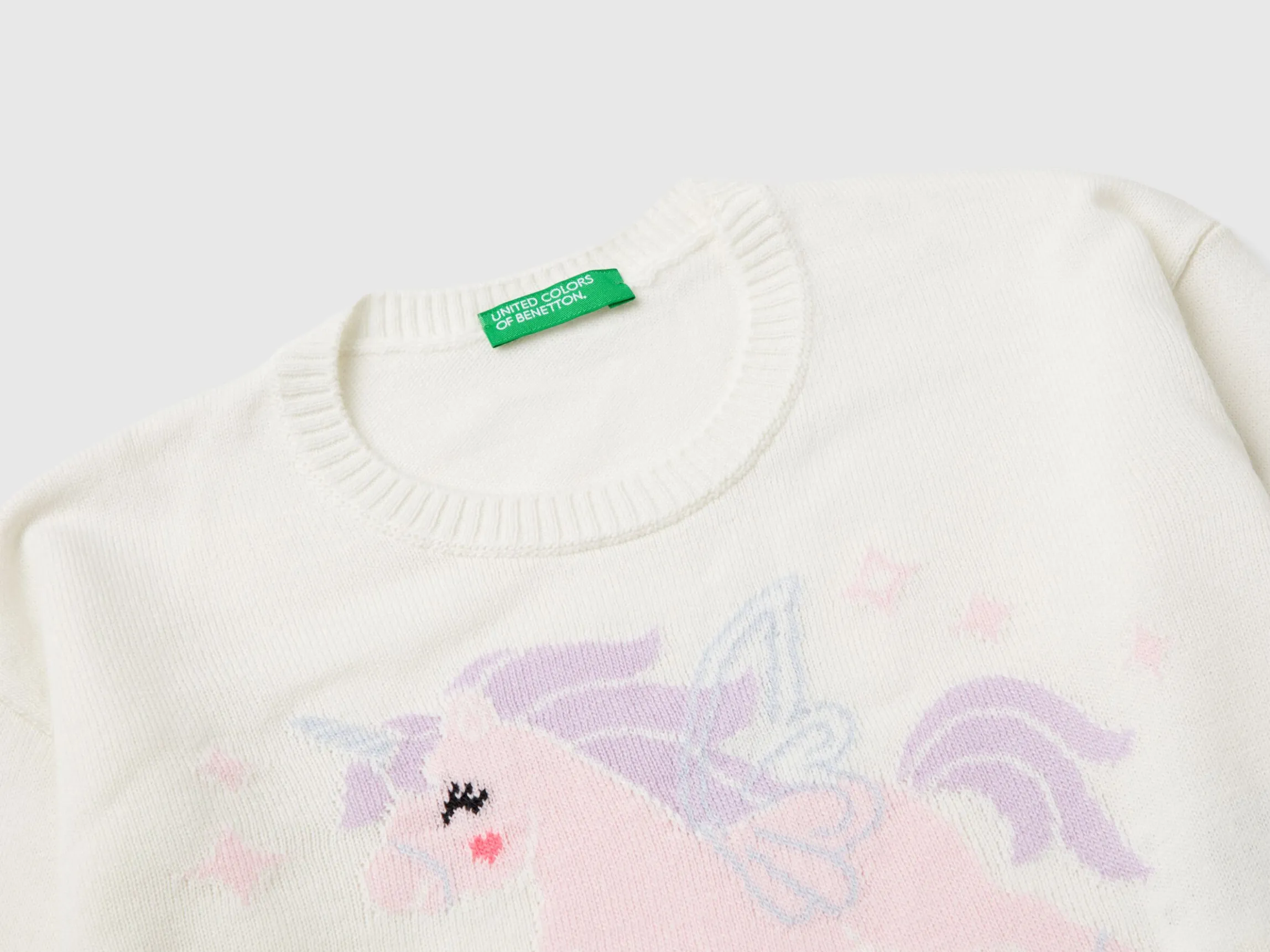 Sweater with unicorn inlay