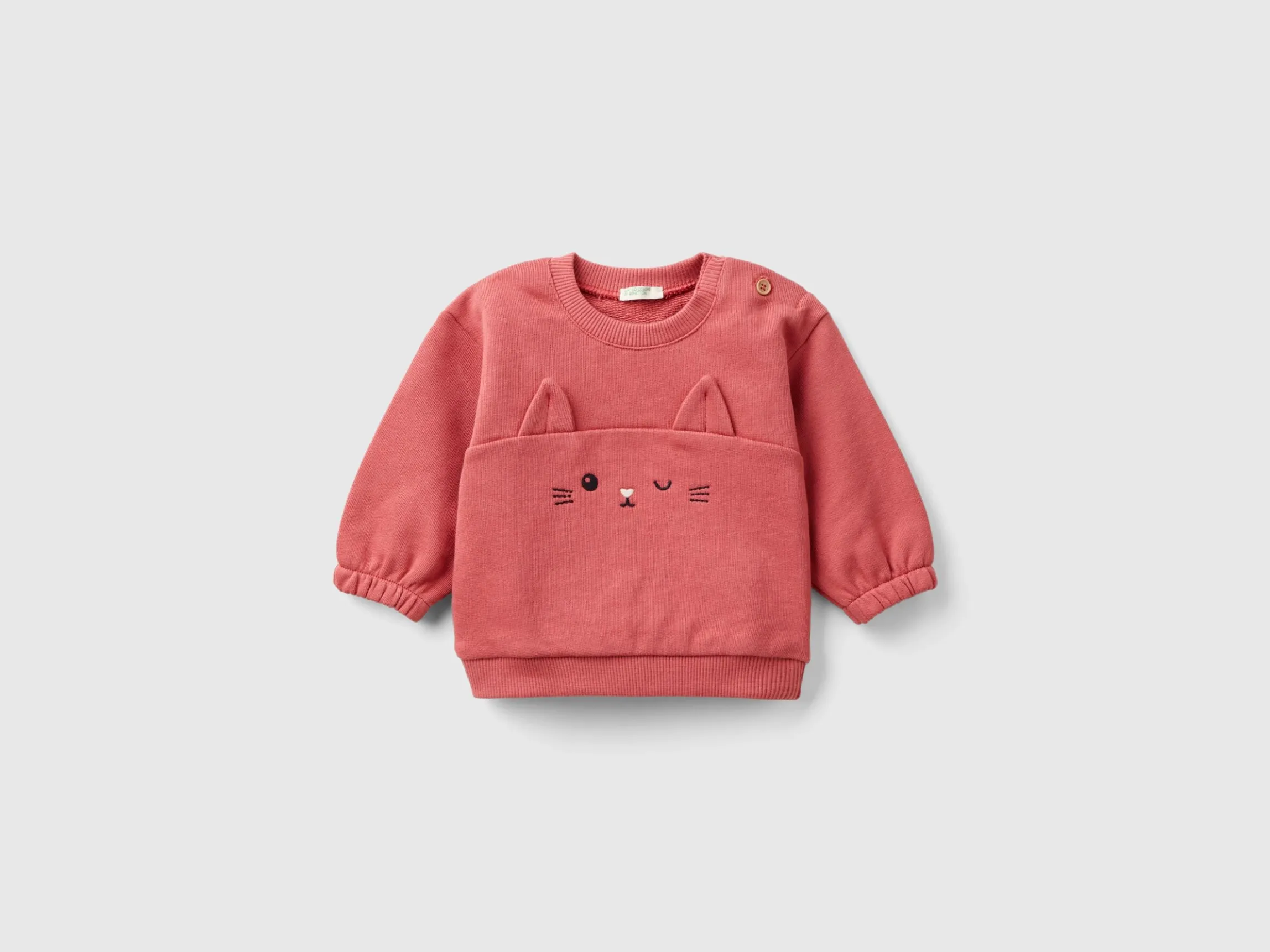 Sweatshirt with embroidery and patches in organic cotton