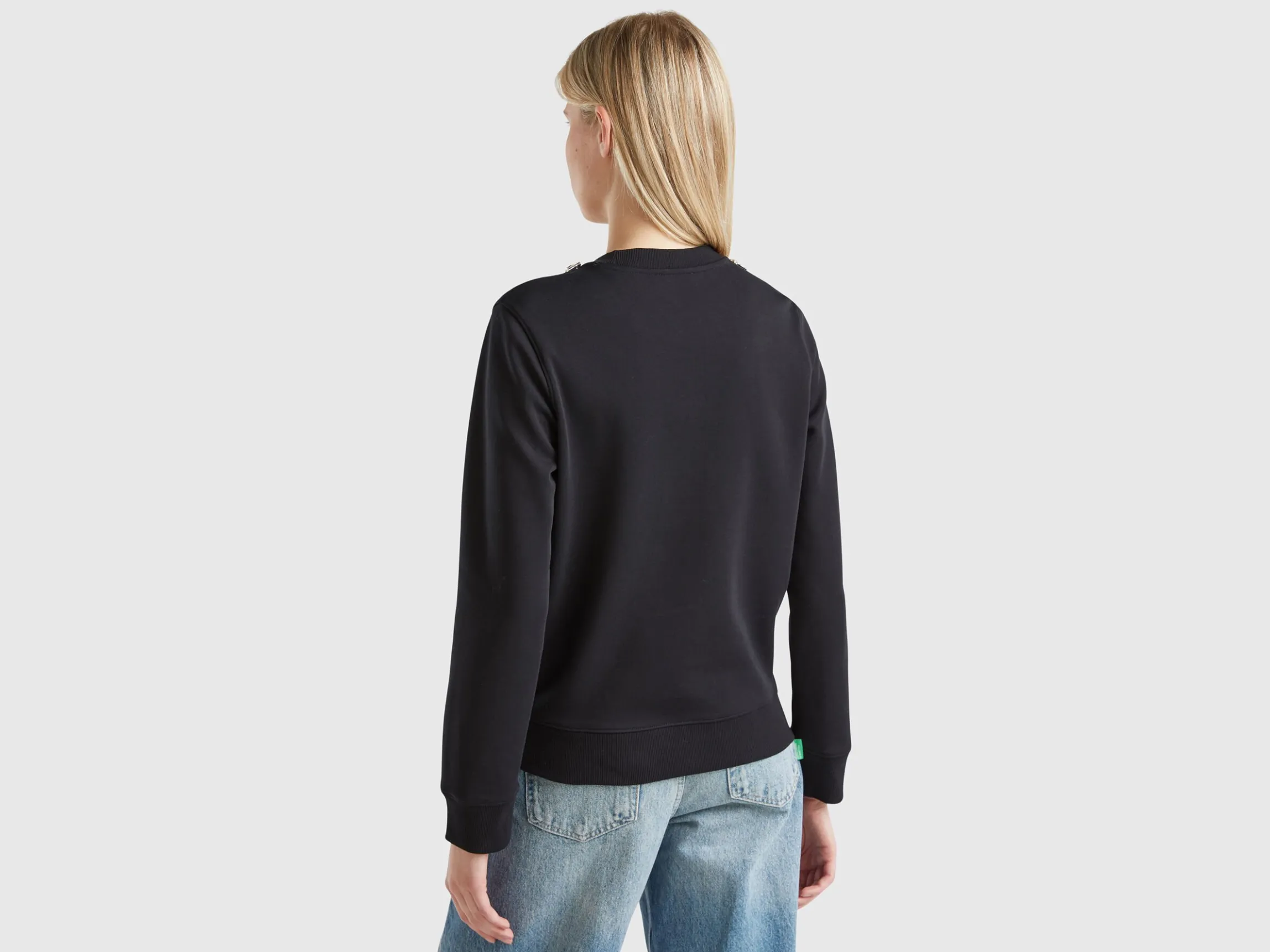 Sweatshirt with jewel effect applique