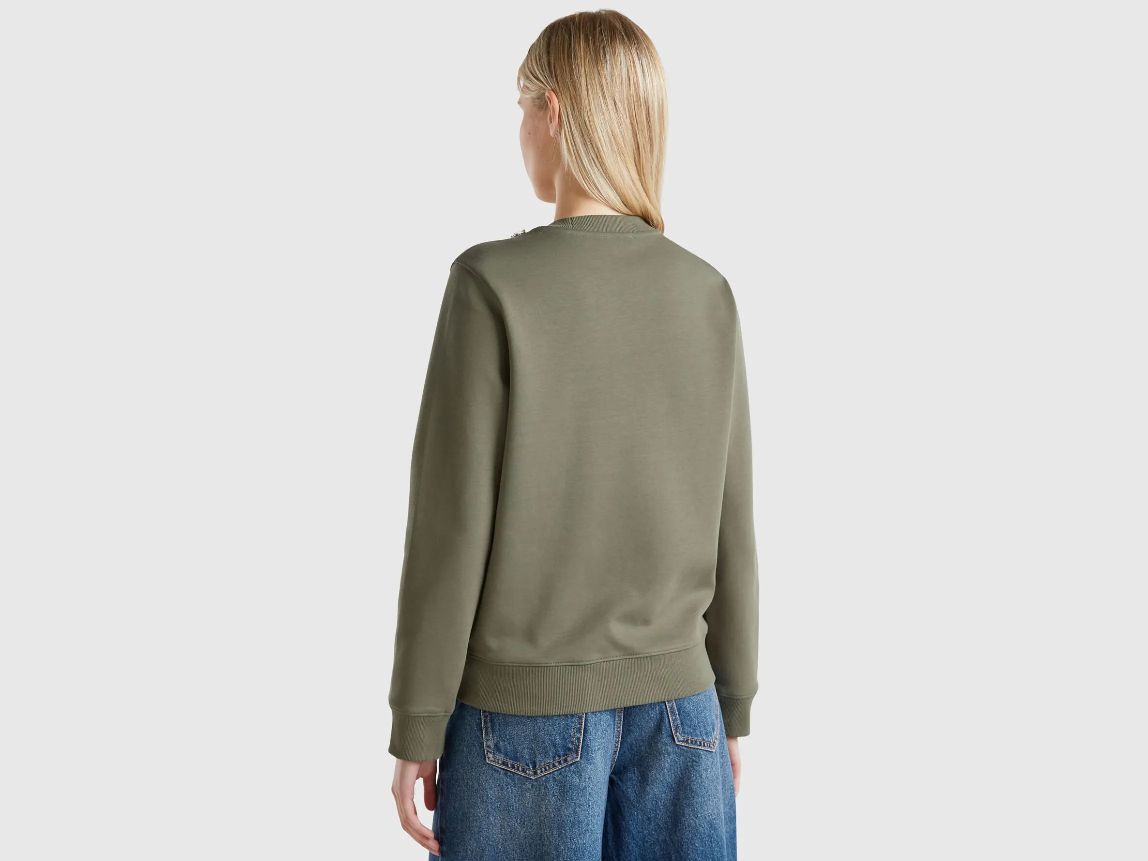 Sweatshirt with jewel effect applique