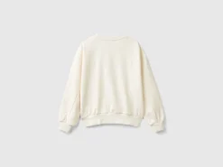 Sweatshirt with jewel-like applique