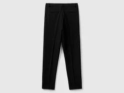 Trousers in fabric