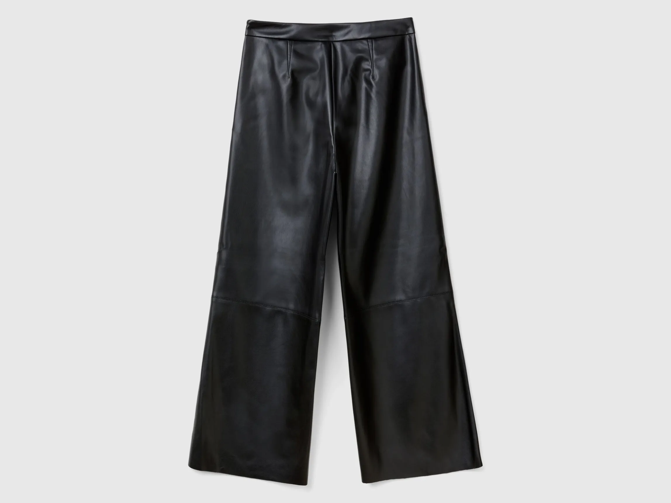Trousers in imitation leather fabric