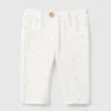 Trousers with chenille pattern print