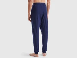 Trousers with elastic logo