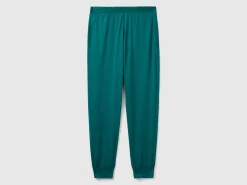 Trousers with elastic logo