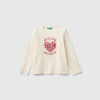 T-shirt with petal effect applique