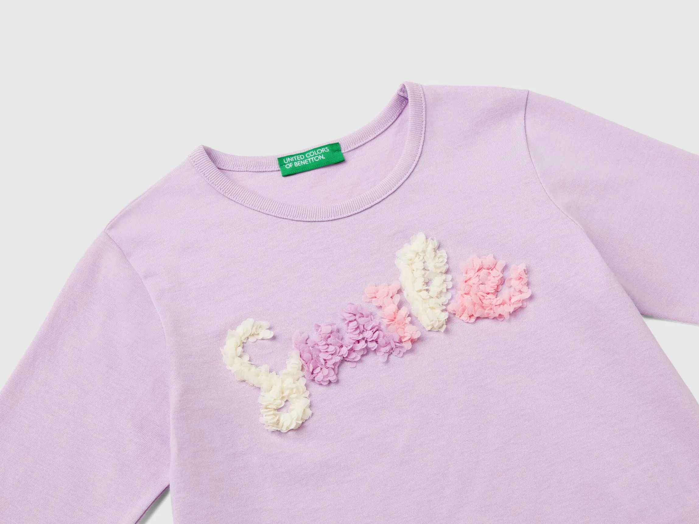 T-shirt with petal effect applique