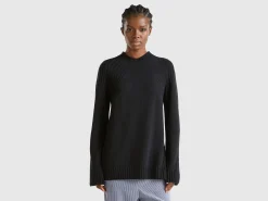 Turtleneck sweater with slits