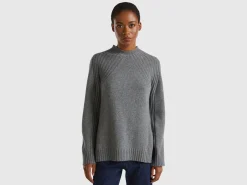 Turtleneck sweater with slits