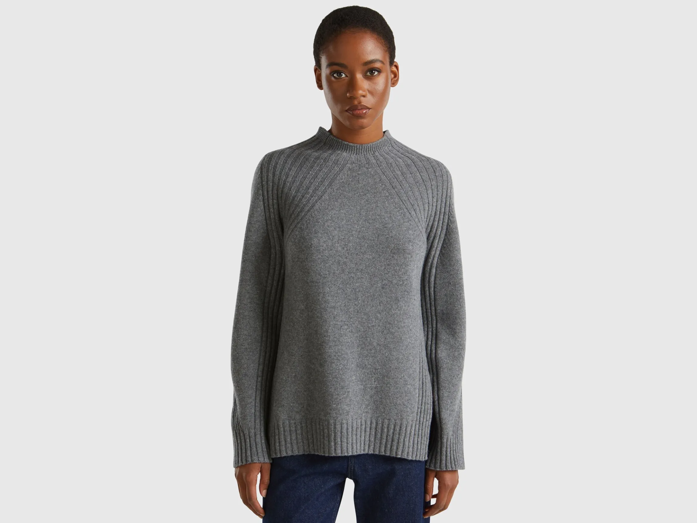 Turtleneck sweater with slits