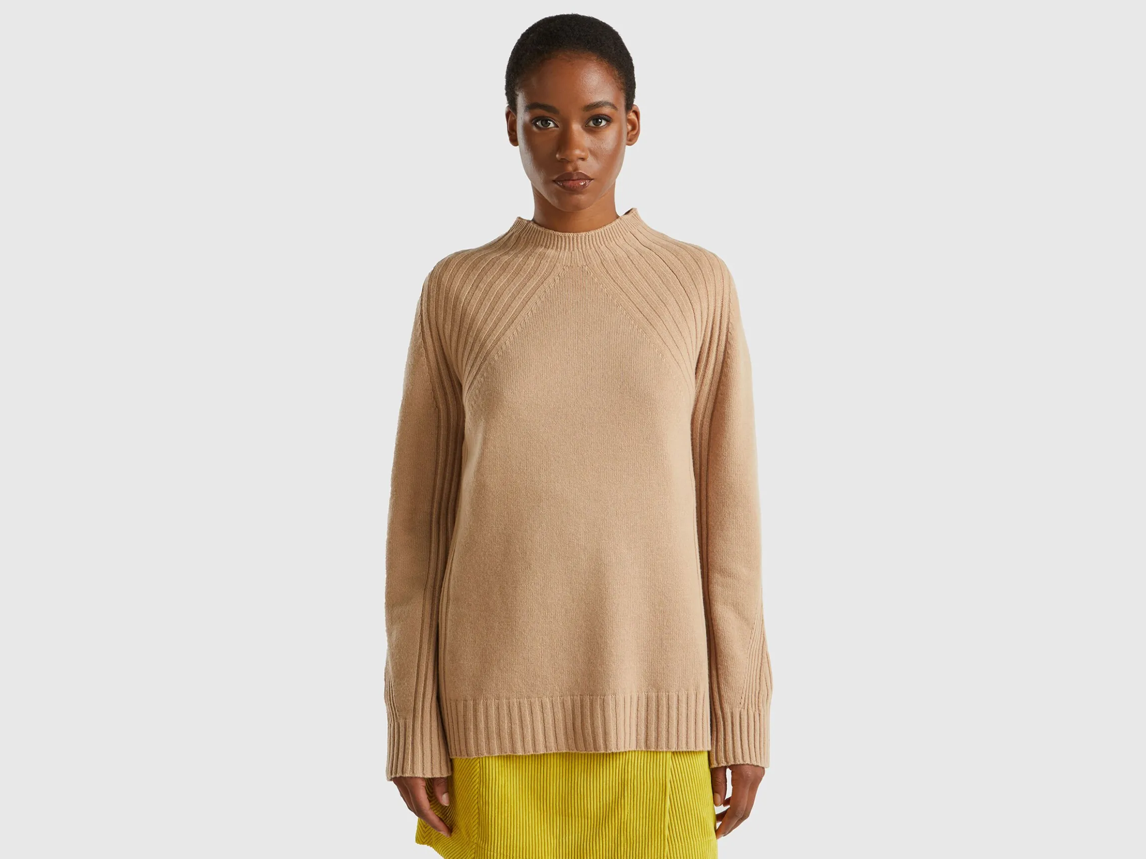 Turtleneck sweater with slits