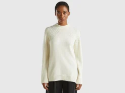 Turtleneck sweater with slits