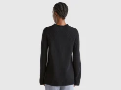 Turtleneck sweater with slits