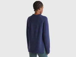 Turtleneck sweater with slits