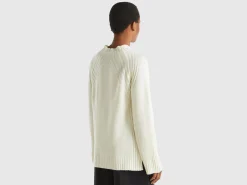 Turtleneck sweater with slits