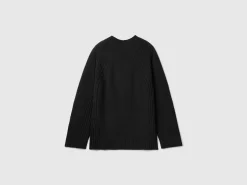 Turtleneck sweater with slits