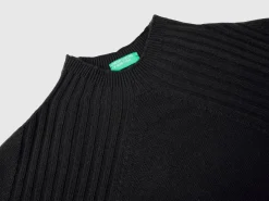 Turtleneck sweater with slits