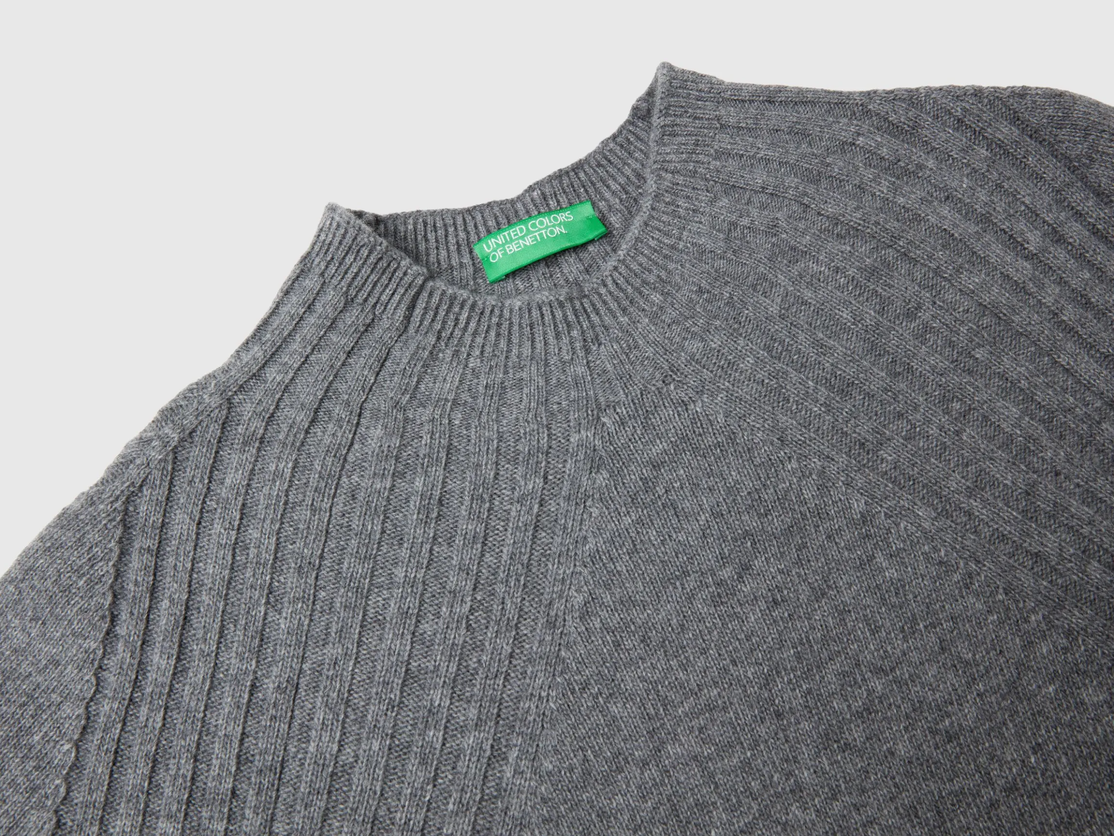 Turtleneck sweater with slits