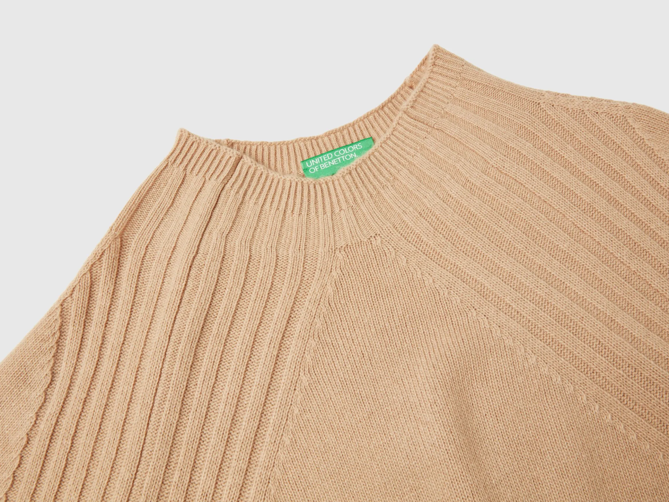 Turtleneck sweater with slits