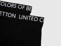 Two boxers with logoed elastic
