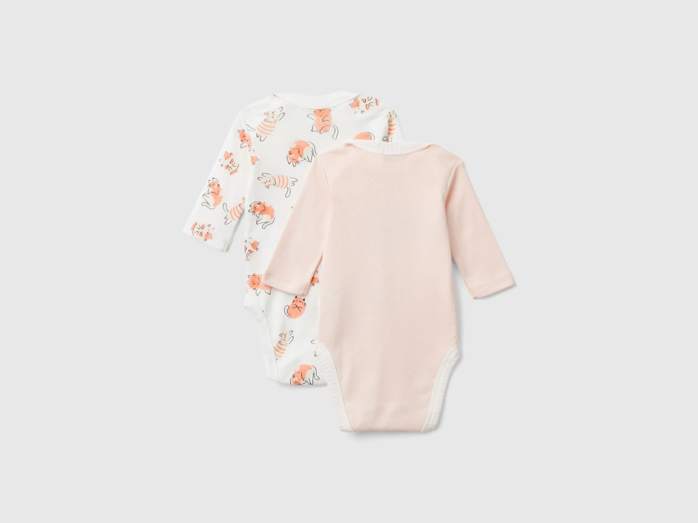 Two long sleeve bodysuits in organic cotton