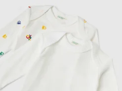 Two long sleeve bodysuits in organic cotton