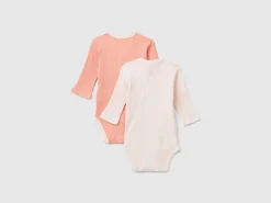 Two long sleeve ribbed bodysuits