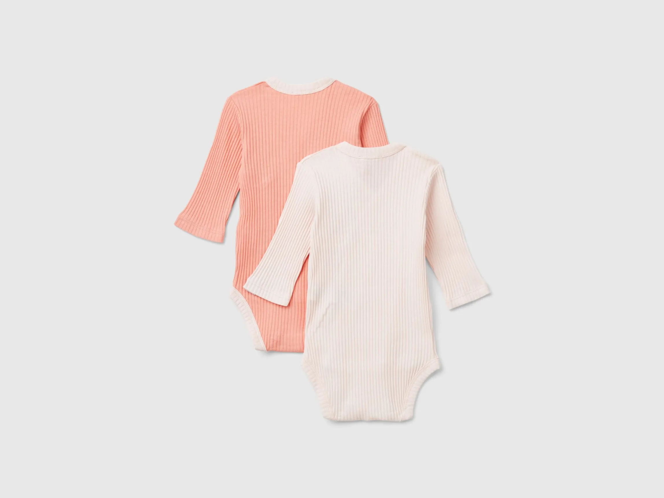 Two long sleeve ribbed bodysuits